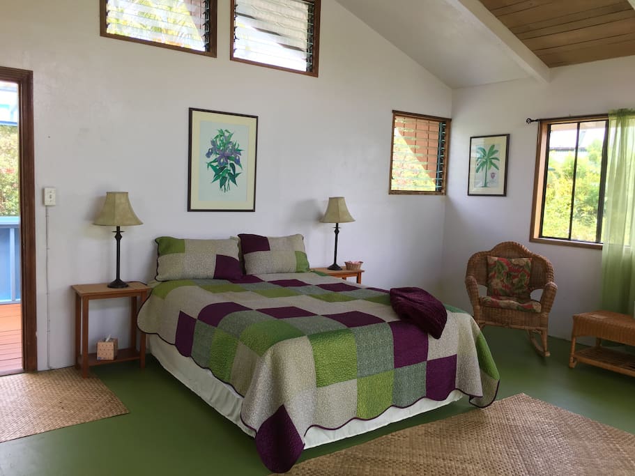 The bedroom has entire floor. We have a sitting porch, and a balcony overlooking the ocean! A queen sized bed. And sitting area for friends!