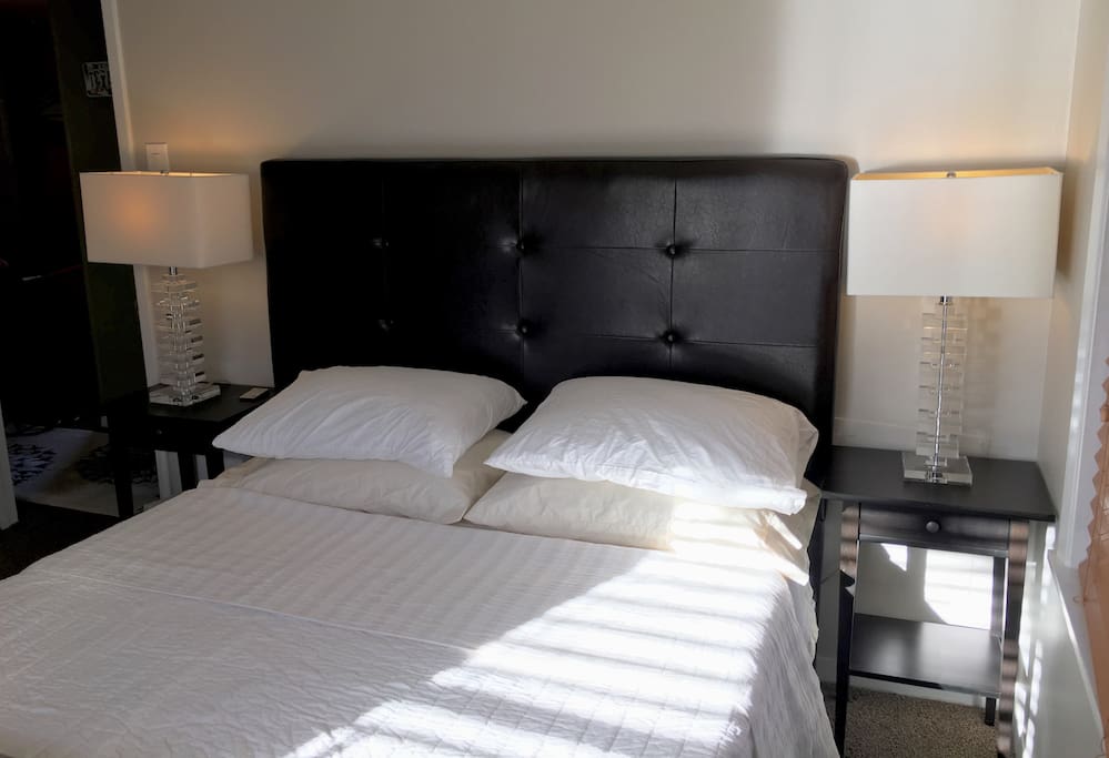 Bedroom 1 with a queen size bed.