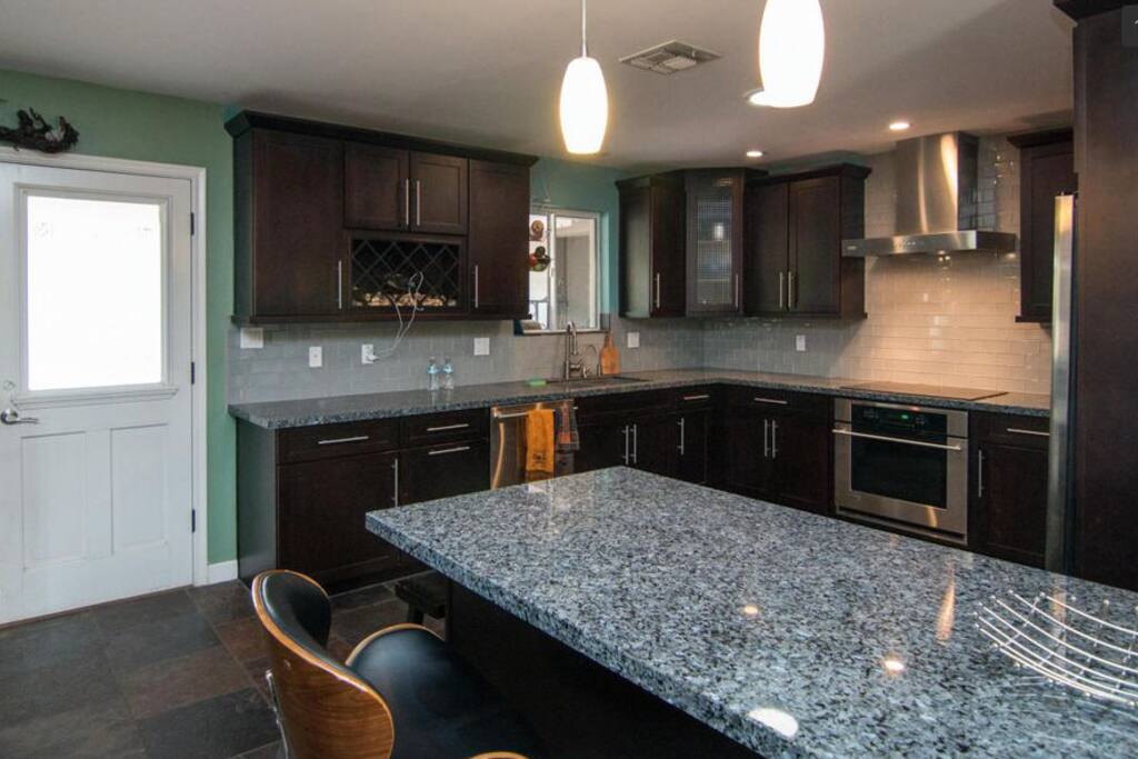 Updated kitchen with granite counters and stainless steel appliances, coffee maker and appliances will be available