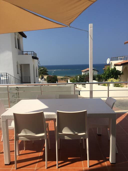 Dining with the Mediterranean in the distance