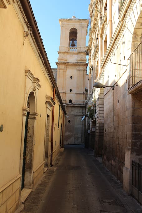 Main Entrance on Via Corrado Occhipinti, on the backyard of St. Domenico Church.