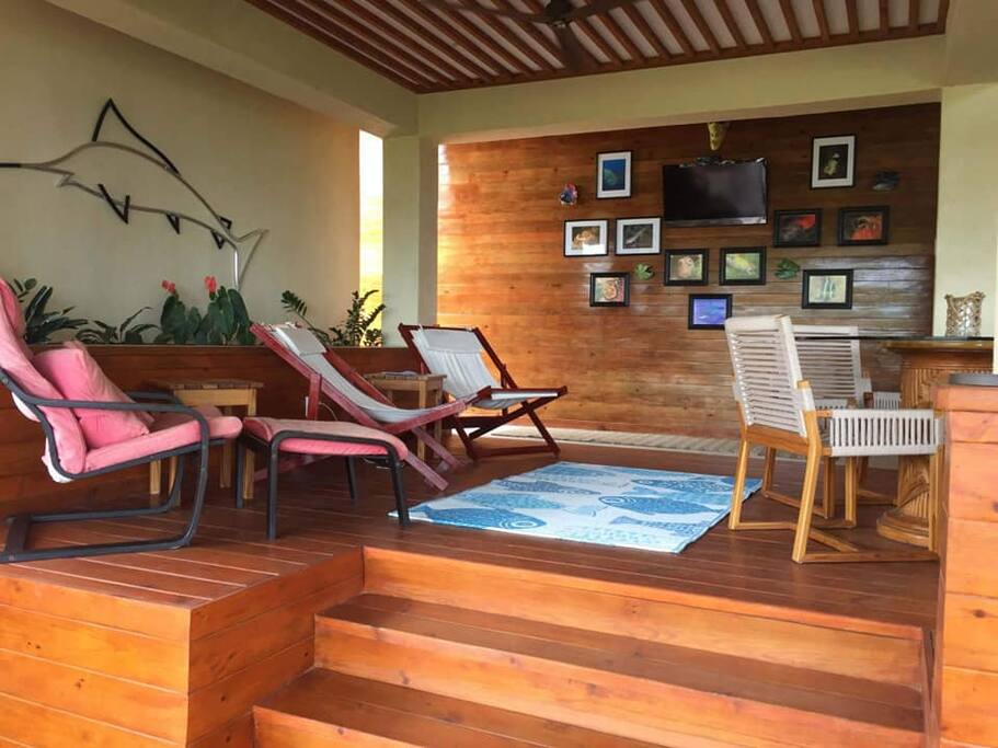 Outdoor living space with telecision and dining table