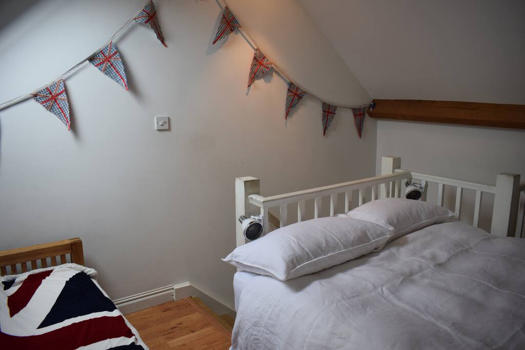 First floor bedroom has deep mattress, feather duvet and pillows, Egyptian cotton bedding.
