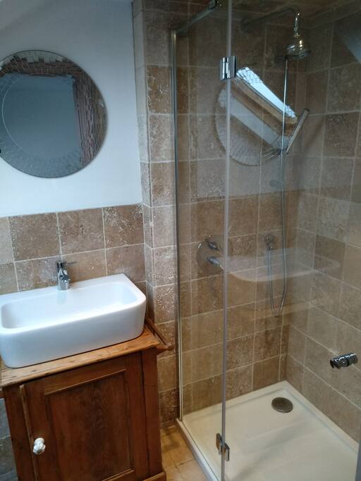 A spacious shower, which never runs out of hot water!