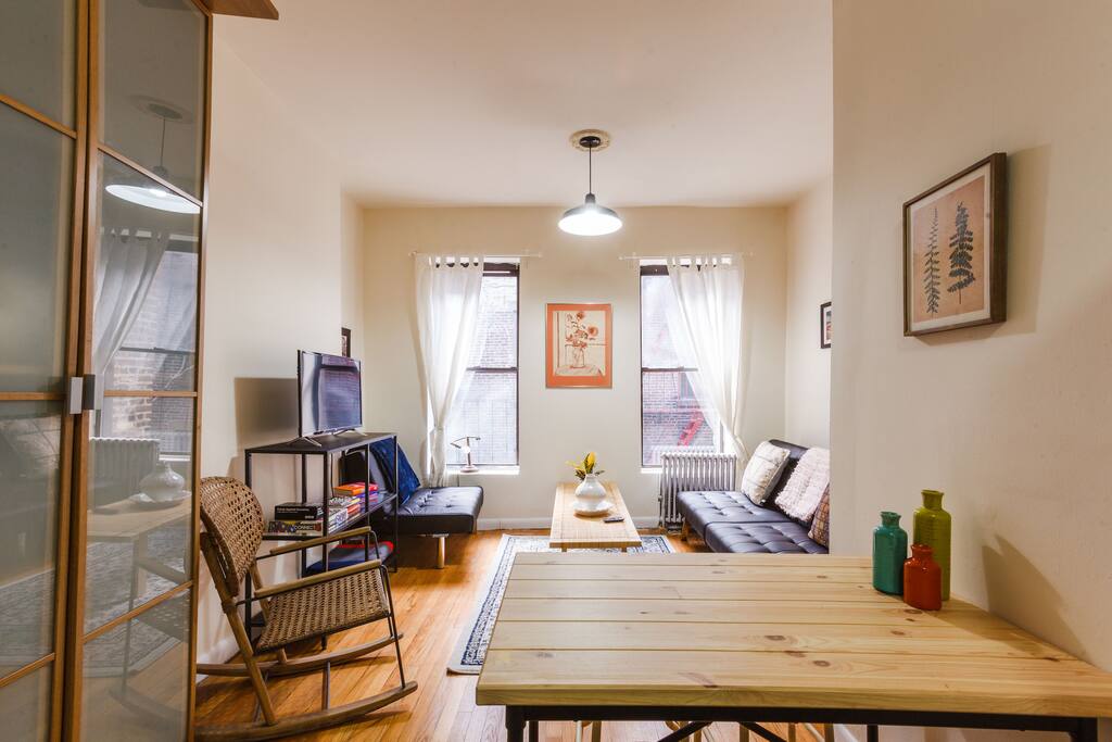 Living space and table that is great for dining or getting some work done!