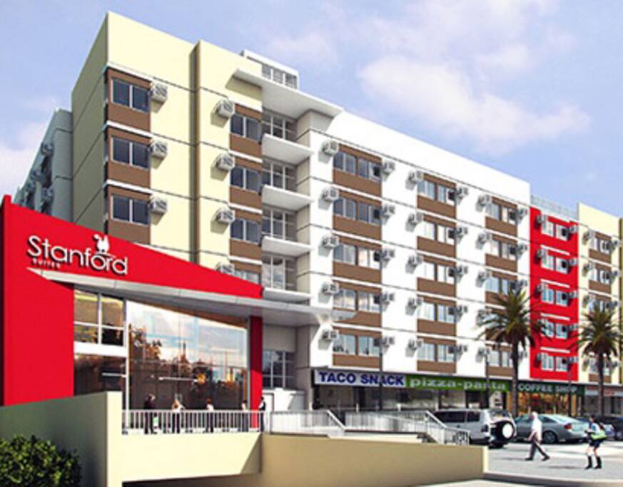 Front Facade with coffee shop, pizza and taco conveniently located on the first floor
