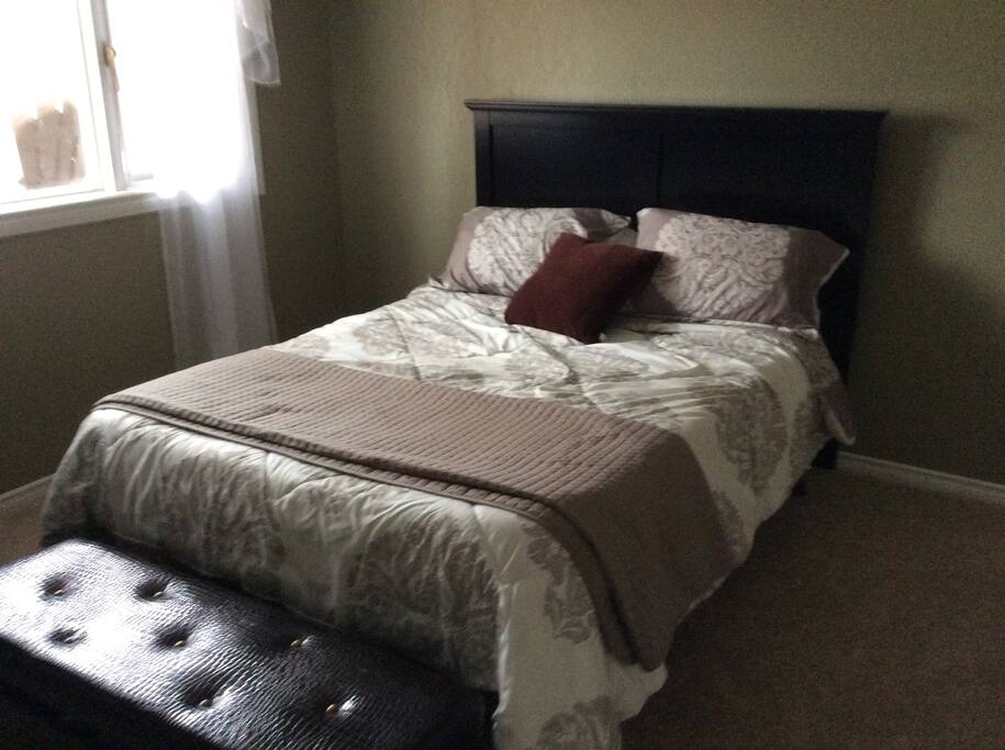 One of four queen bedrooms
