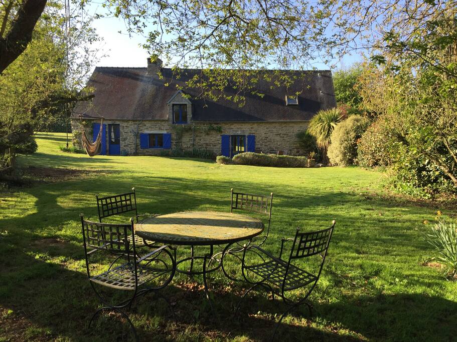 The rear of the cottage from the shade of the fruit trees - we have plum, apple, cherry, hazelnut, walnut and chestnut trees, so please help yourself to any fruit or nuts in season.