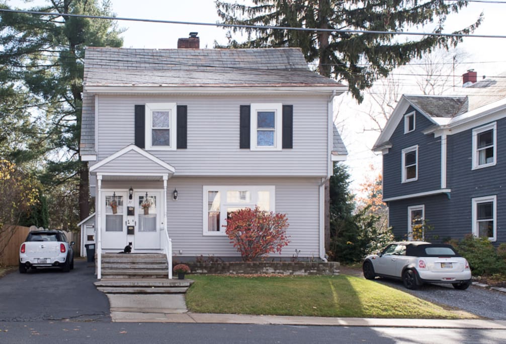 You will park in driveway to the right and your door is on the left (when facing house)