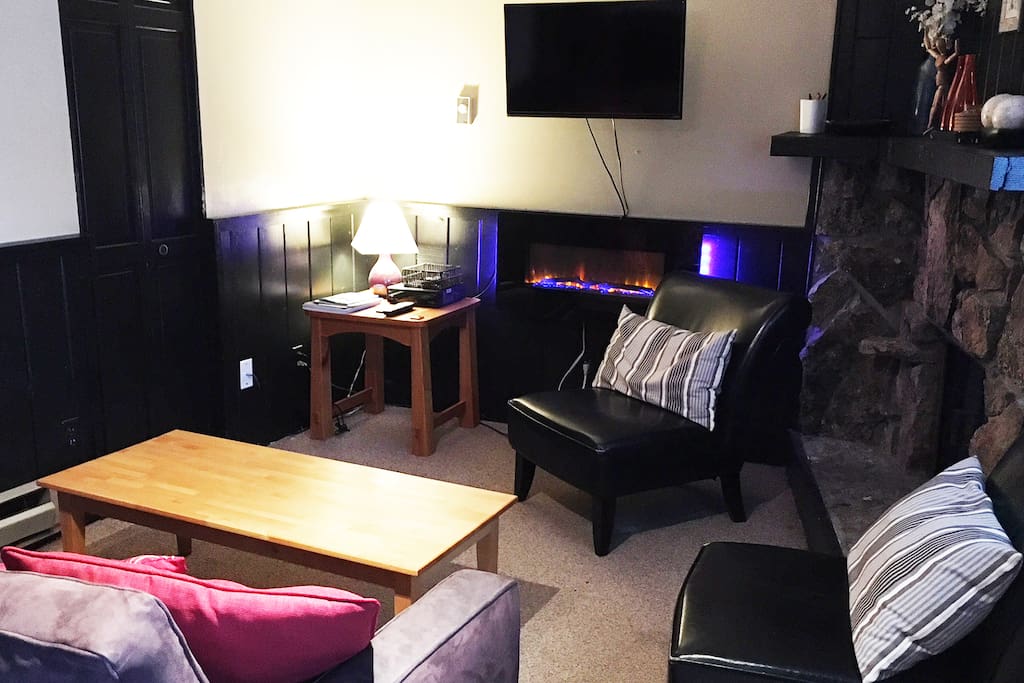lovely living with cable tv, gas fireplace and pull out queen couch.