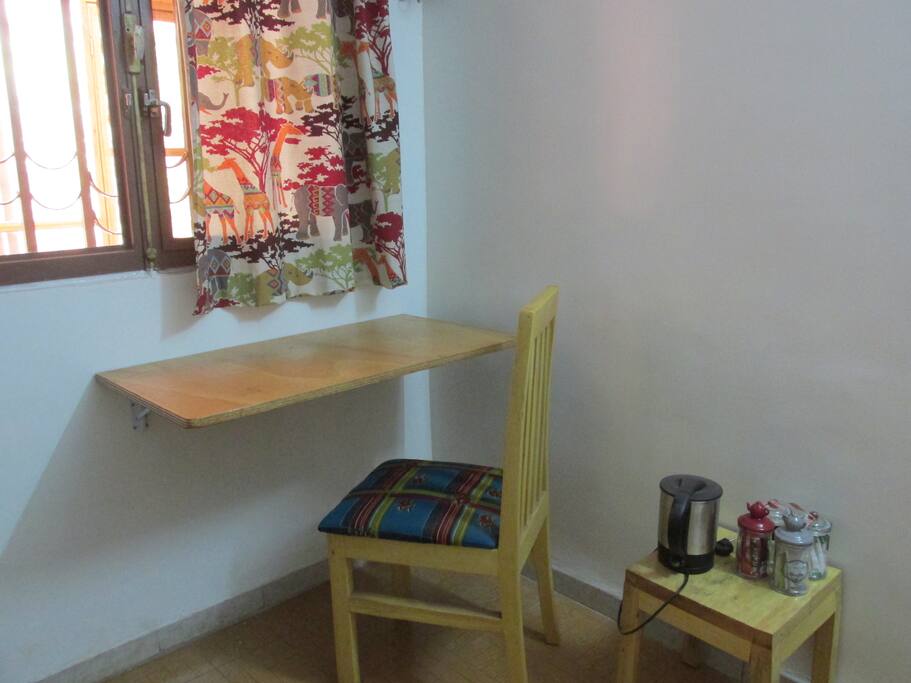 A sturdy fold down table to have a desk when you need it.