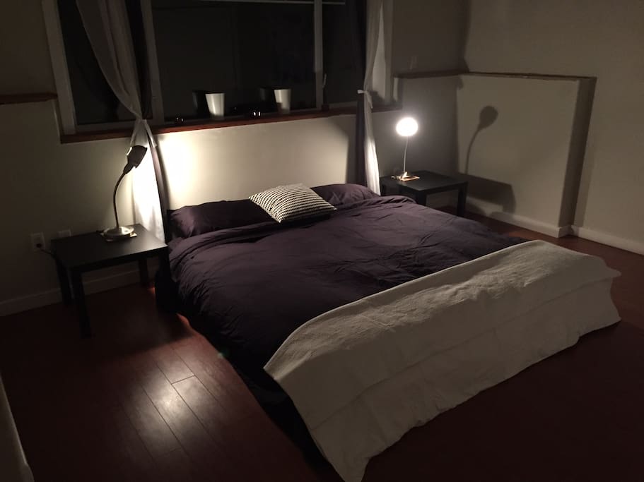 Large bedroom with a very comfortable king size bed.