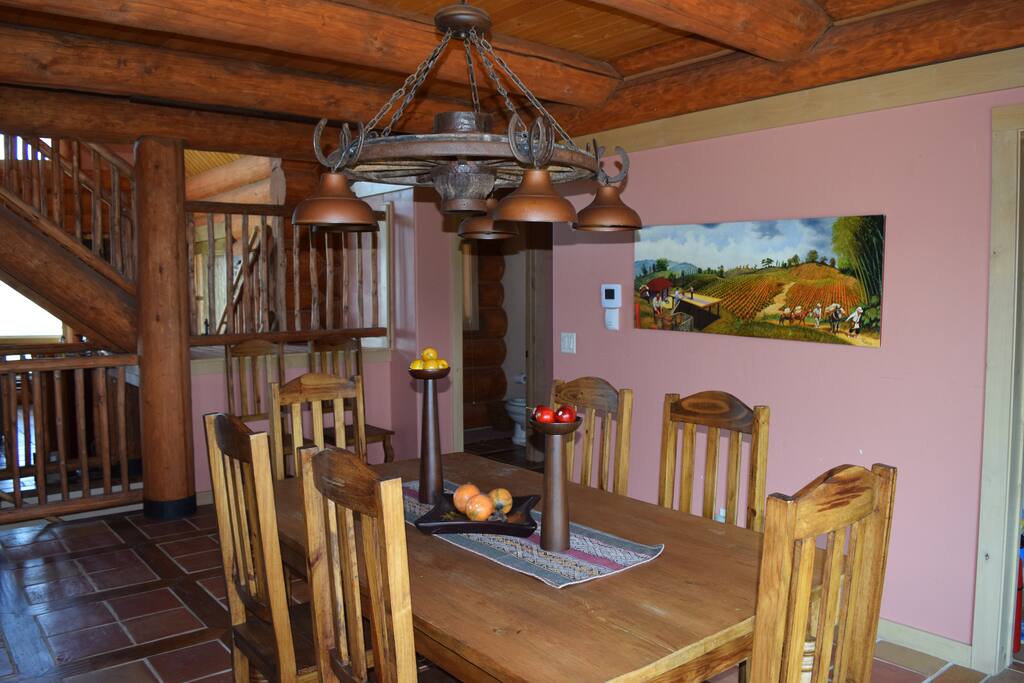 The dining area seats with additional seating at the kitchen bar.