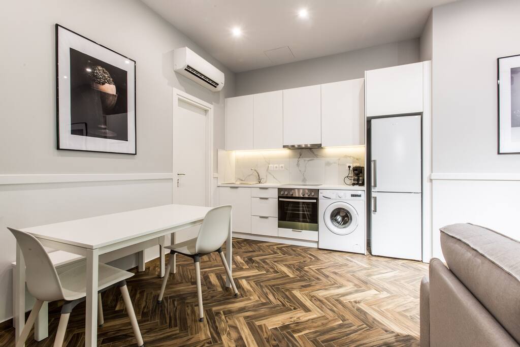 Living room with kitchen facilities