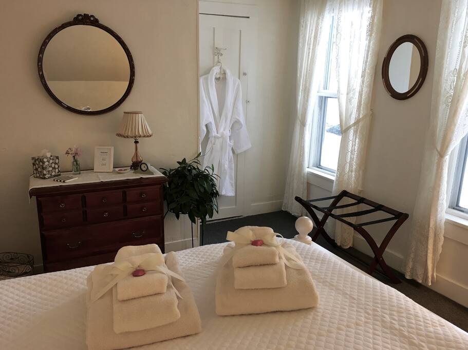 Bathrobes, dresser and huge closet with loads of storage space.