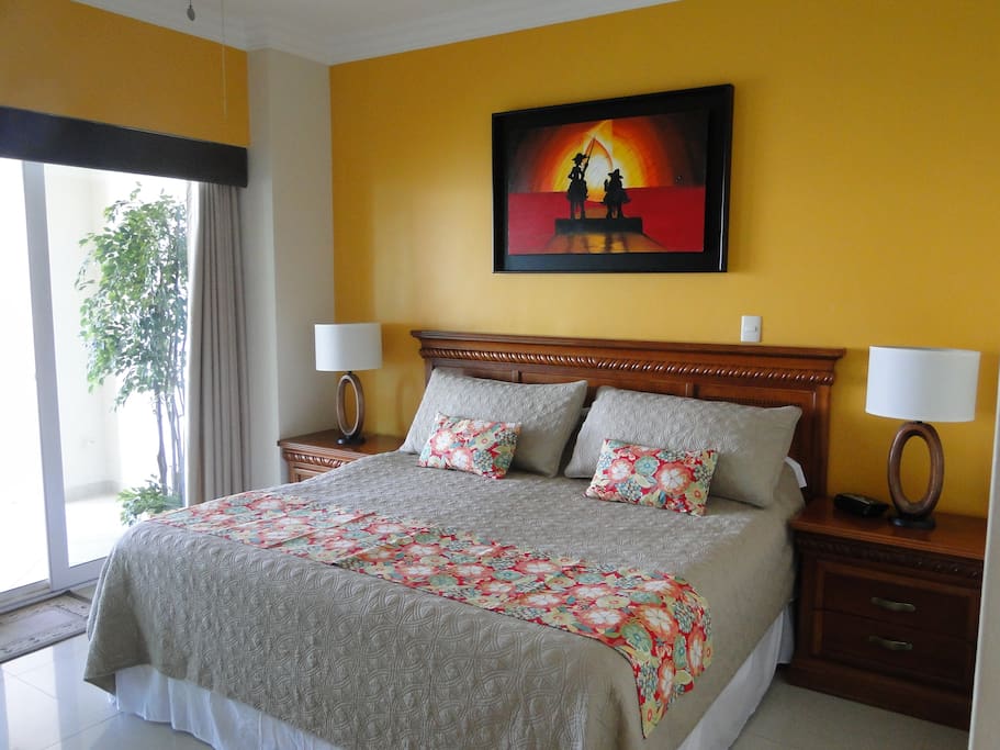 Master Bedroom w/ King Bed and Ocean Front Patio