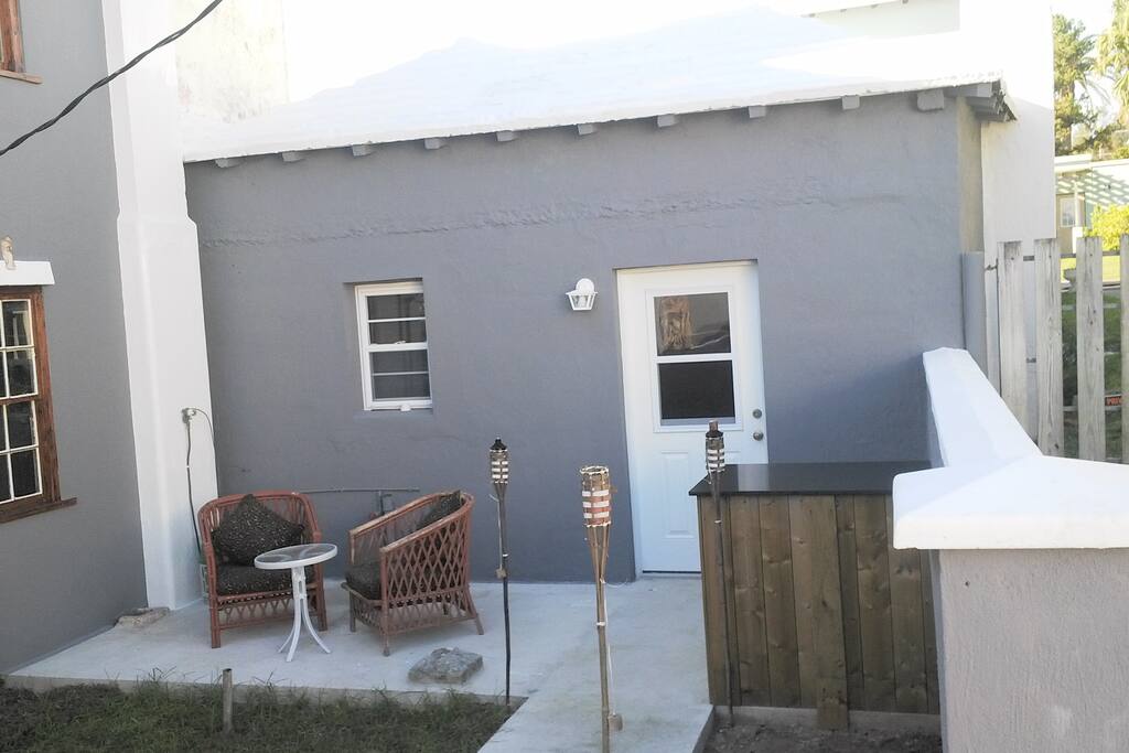 Bar and outdoor seating area is tucked away.