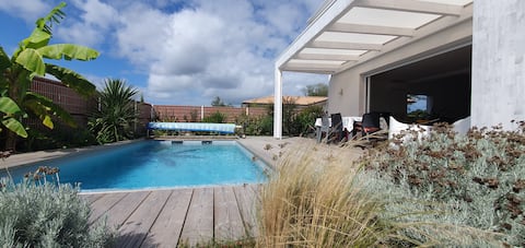 Villa between golf & ocean with bowling alley, pool.