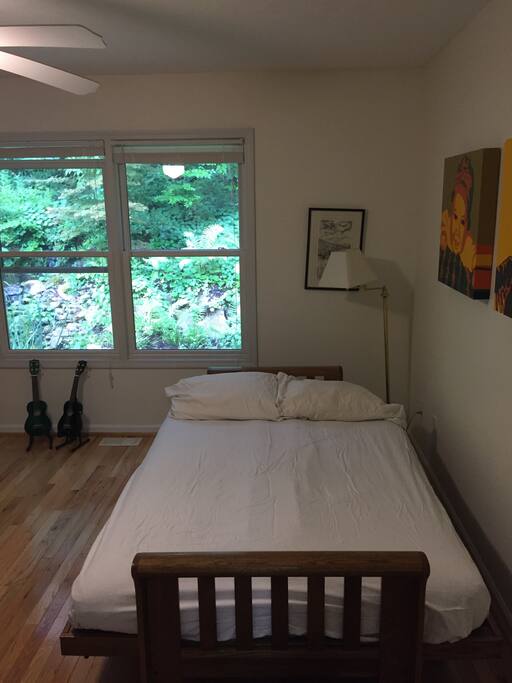 The futon bedroom has a waterfall right outside the window