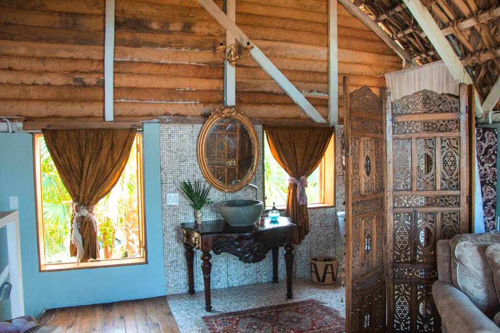 Old world charm meets tropical luxe accommodations in this private suite.