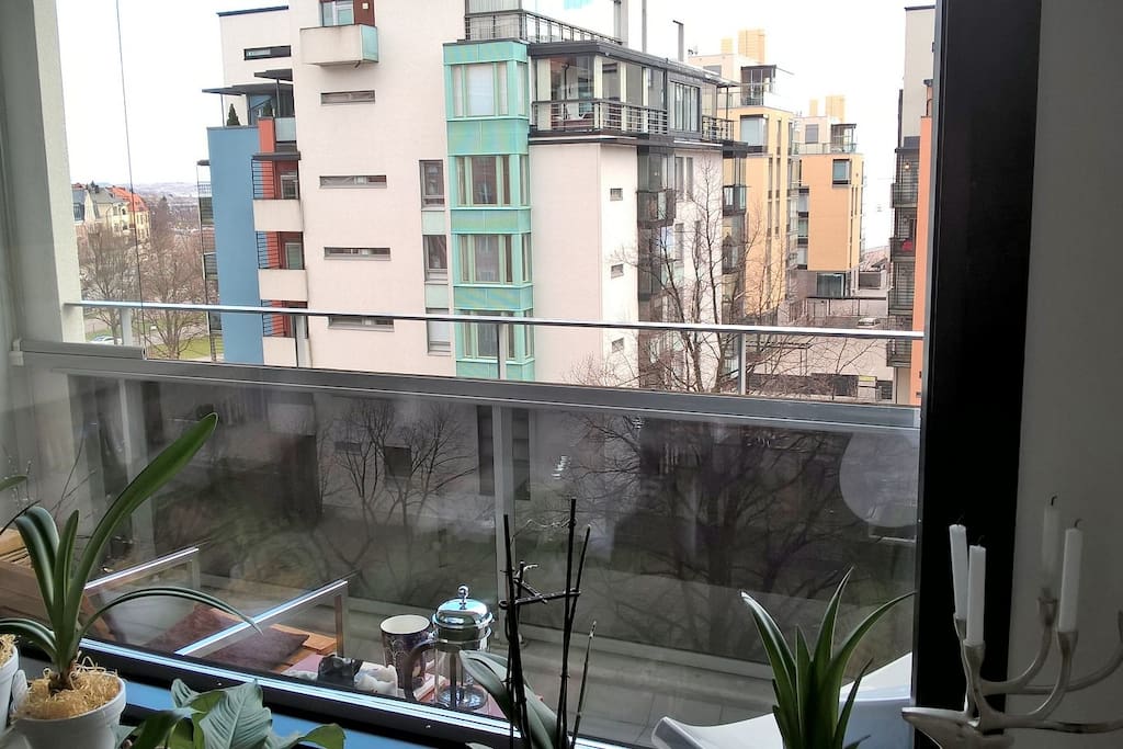 The terrace has nice views over some modern and some traditional architecture. Partial sea view.