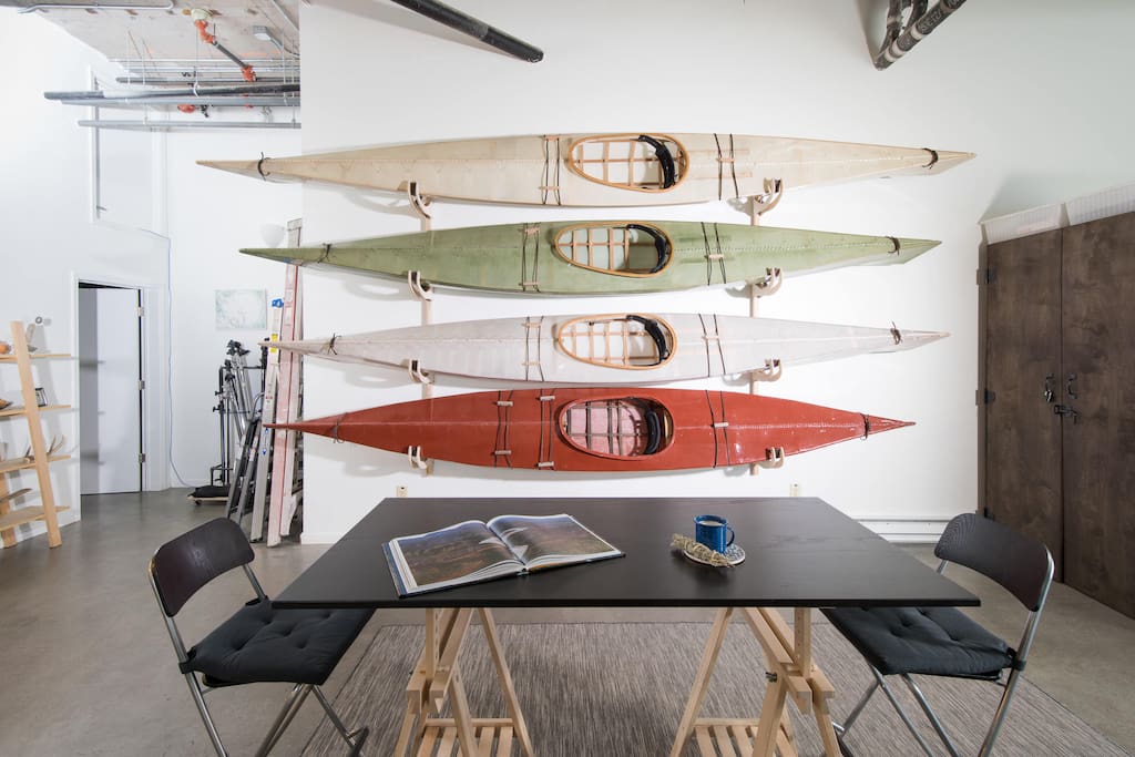 Main space has 12' ceilings, kayaks, and a dining table