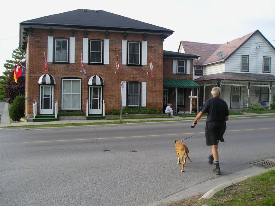 Brooke walking our dog Nina home from a hike up the McCauley mountain.