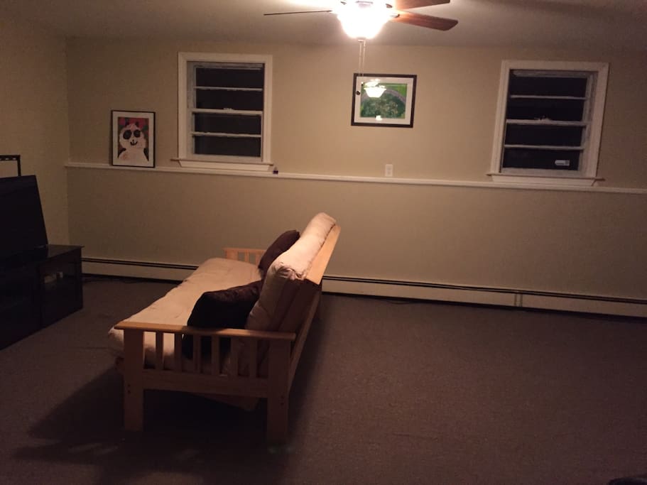 Waiting on screws to mount SMART TV and new furniture to add sectional seating furniture.