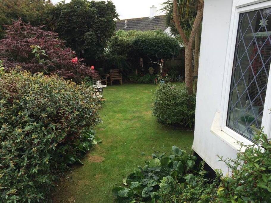 View of Garden from French doors of Bedroom