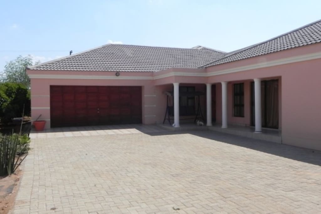 Paved compound motorised double garage