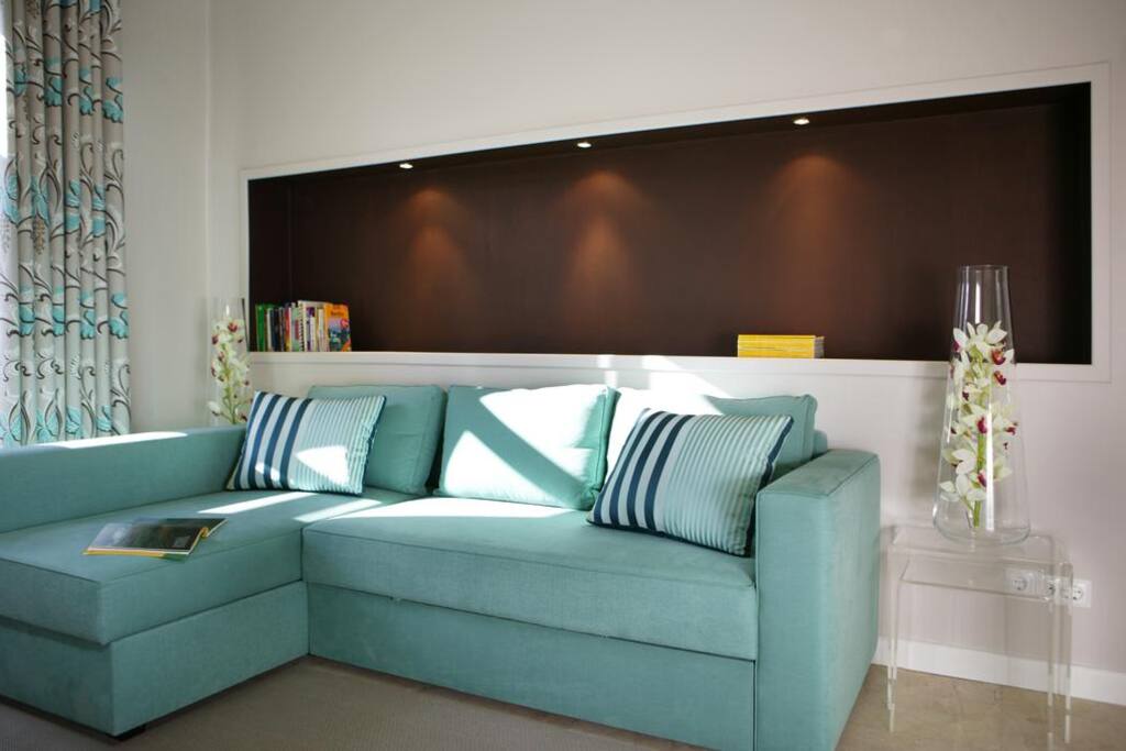 Sala com sofá-cama