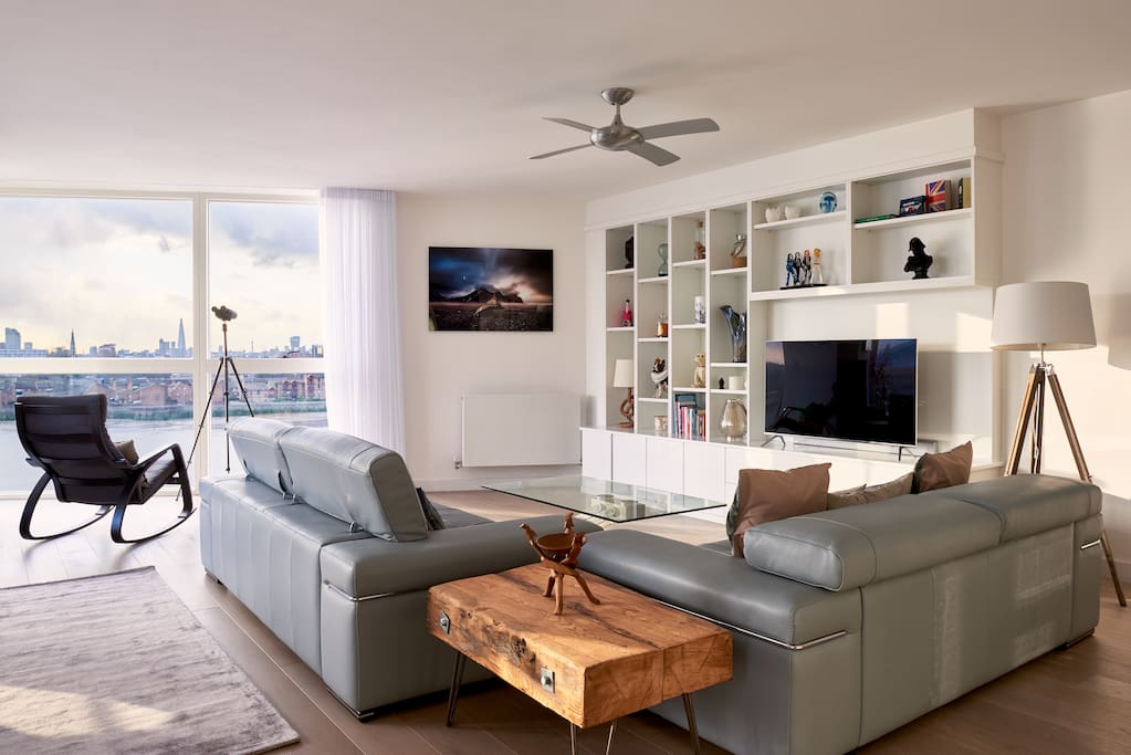 Large light living area with full-length windows