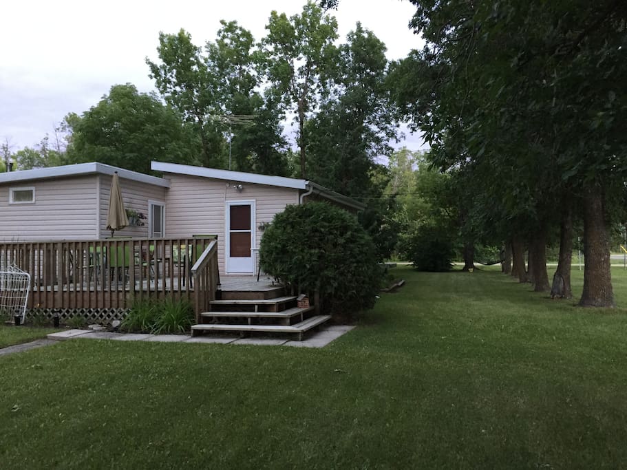 Large lot with firepit, hammock, gas grill, two decks and yard games for use