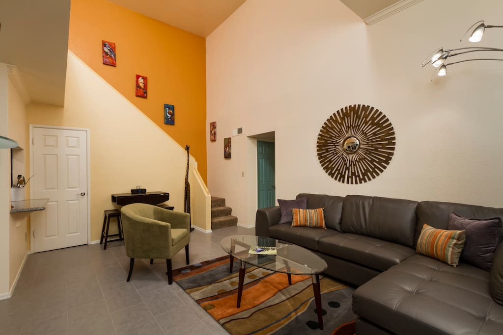 Living room with stairs to guest loft