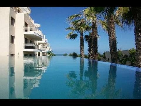 Great sunset Beach view apt. Gated residence 24h.
