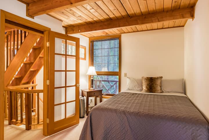 Bedroom has a queen and twin bed.