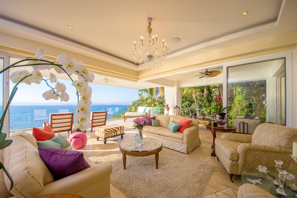 Formal living room surrounded by Ocean and Jungle