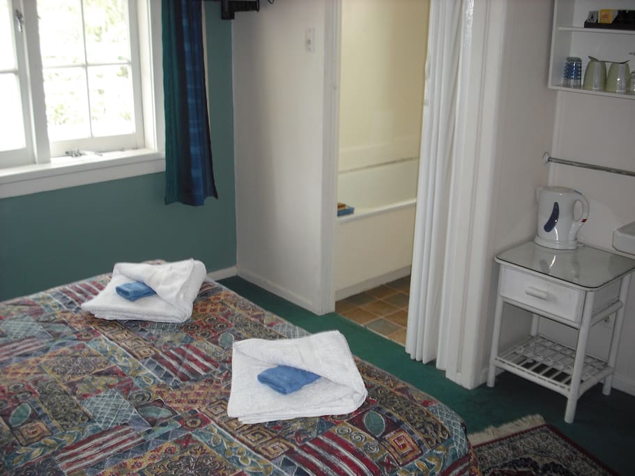 Full bath and shower in ensuite...