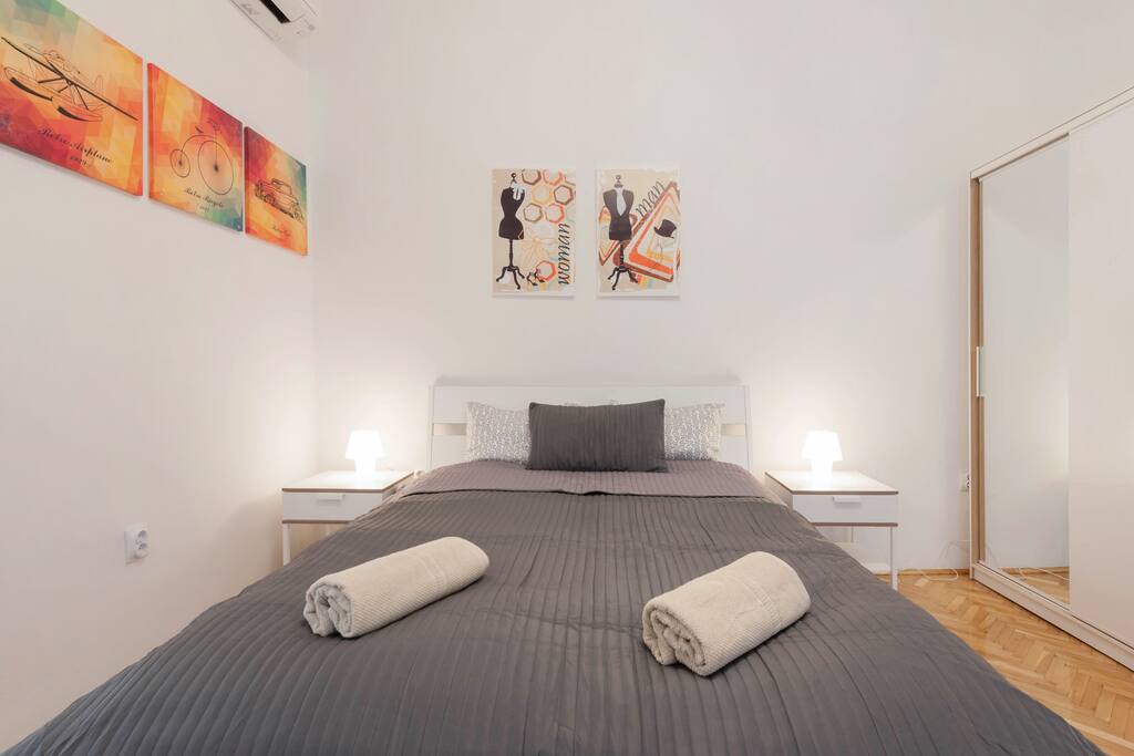 The king size double bed in the first bedroom