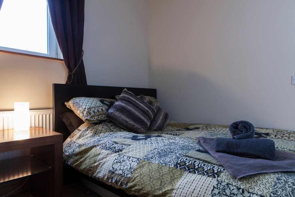 Private double room with natural light.
