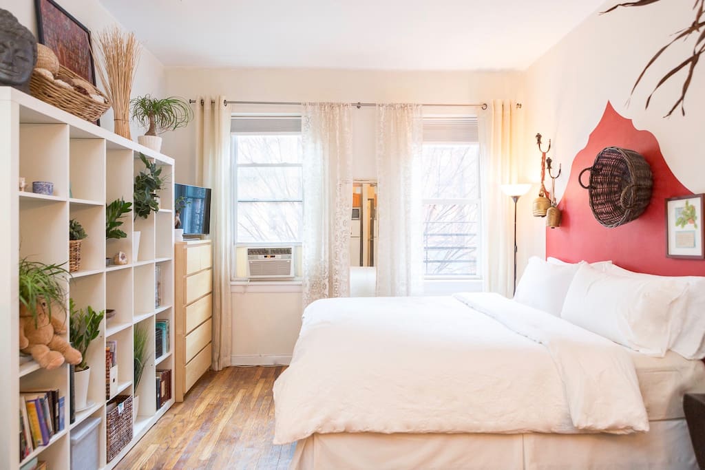 Great photo books and lots of linens and pillows fill the apartment