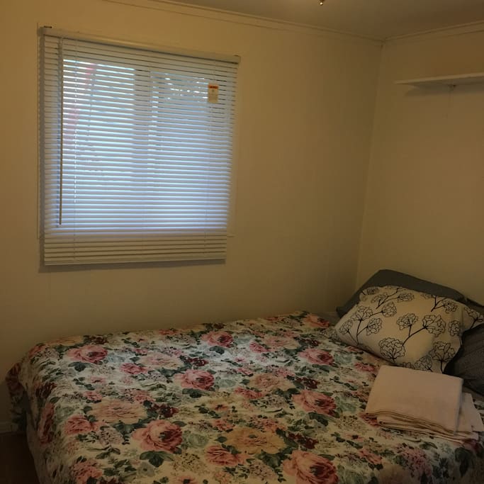 Bed room one with double bed