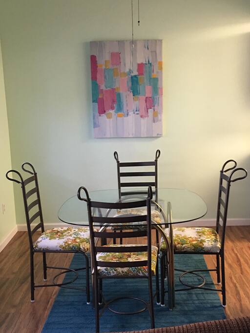 Dining area with overhead ceiling fan.