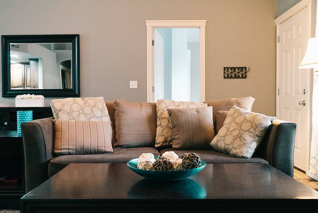 Enjoy a relaxing pillow-back sofa while you kick your feet up and watch one of hundreds of channels on DirectTv or use the complimentary wifi