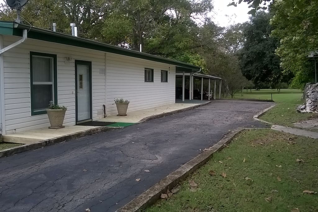 View of Cottage, carport and backyard