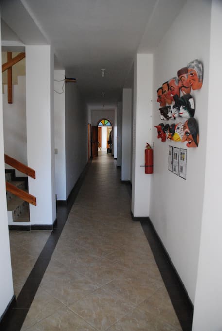 Hallway leading from kitchen to rooms.
