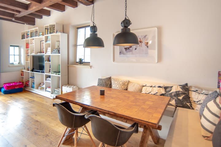 Monumental warehouse apartment on historic canal gallery image 2