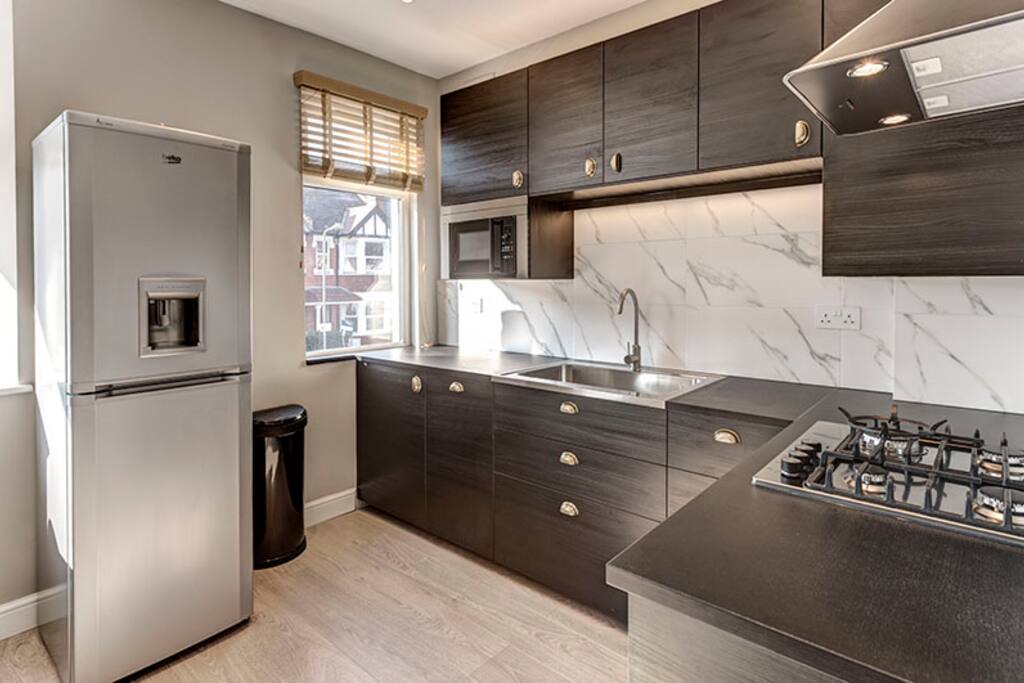Everything you need in the kitchen, including an espresso maker.