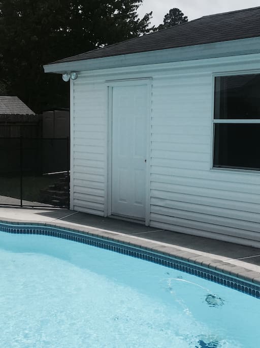 Guest cottage is located next to pool