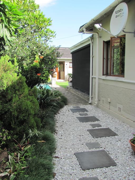 Pretty garden walkway from the undercover parking
